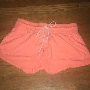 peachish orange shorts